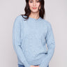 Oxford sweater with a classic crew neckline and knit cuffs, featuring elegant tonal embroidery by Charlie B.