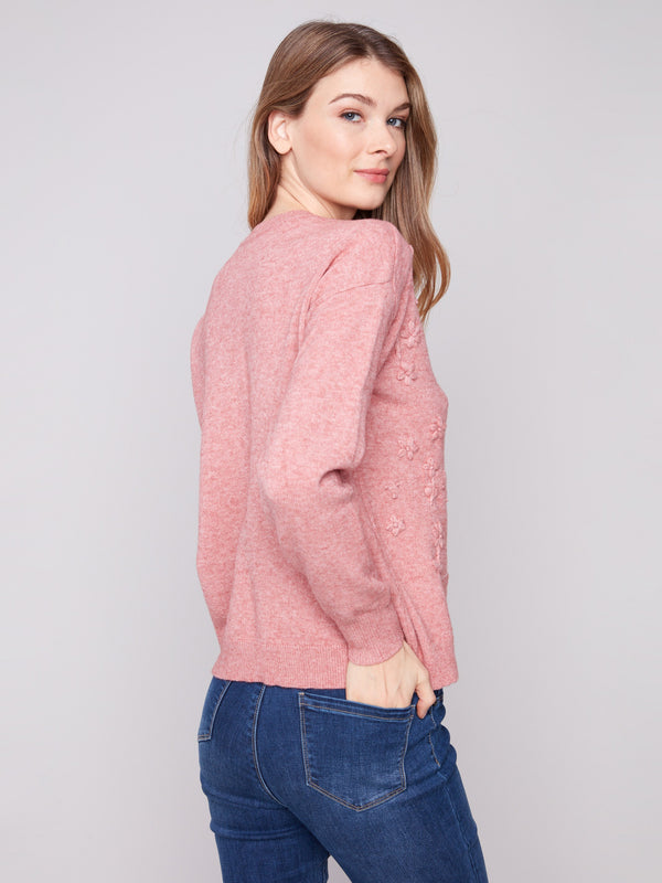 Charming primrose sweater with a drop shoulder design and delicate knit details by Charlie B.