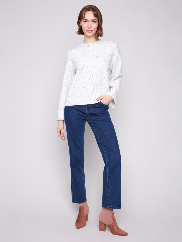 White speckled sweater with wide cuffs, crafted in a stylish drop shoulder design by Charlie B.