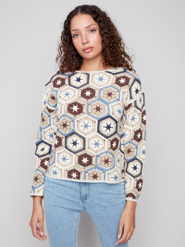 Crochet top with hexagonal design crafted from a soft cotton blend fabric, offering comfort and style by Charlie B.