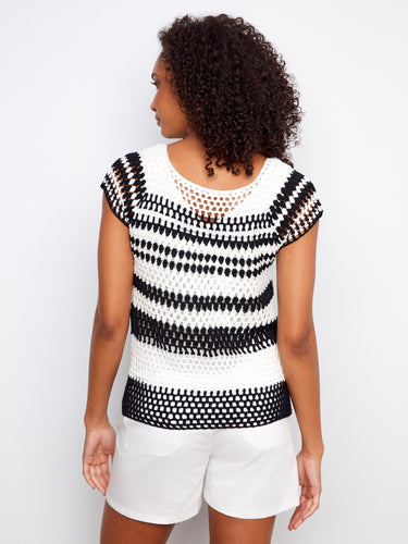 The raglan cap sleeves on this striped top provide comfort and style, making it an essential wardrobe piece by Charlie B.