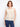 Natural crochet vest featuring a sleeveless design, ideal for summer wear by Charlie B.