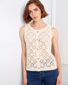 Elegant crochet vest with intricate patterns and crew neckline for added style by Charlie B.