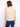 Chic sleeveless vest in a natural hue, perfect for layering over casual outfits by Charlie B.