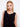 Chic crochet top with crew neckline and button-up detail, offering a stylish sleeveless look by Charlie B.