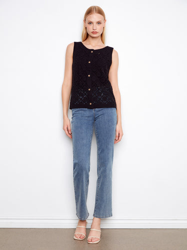 Stylish button-up crochet top paired with jeans, showcasing a modern sleeveless style by Charlie B.
