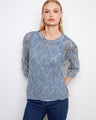 Blue haze crochet sweater featuring a relaxed fit and intricate pattern for a chic look by Charlie B.