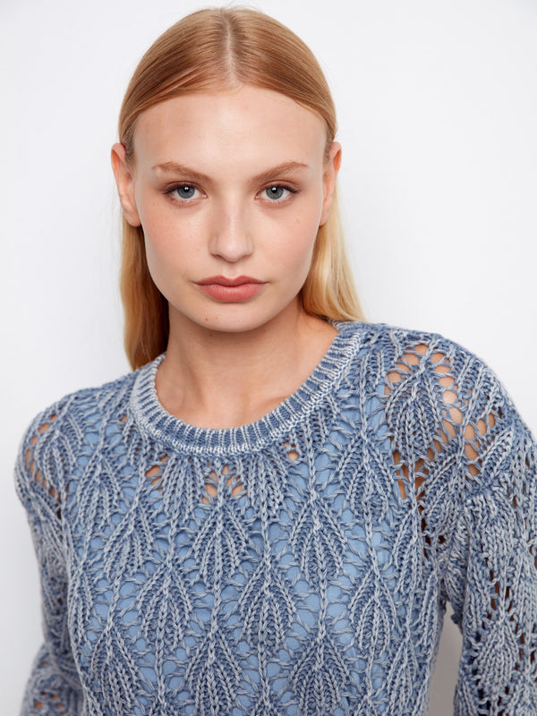 Elegant crochet sweater in blue haze with 100% cotton fabric, perfect for comfort and style by Charlie B.