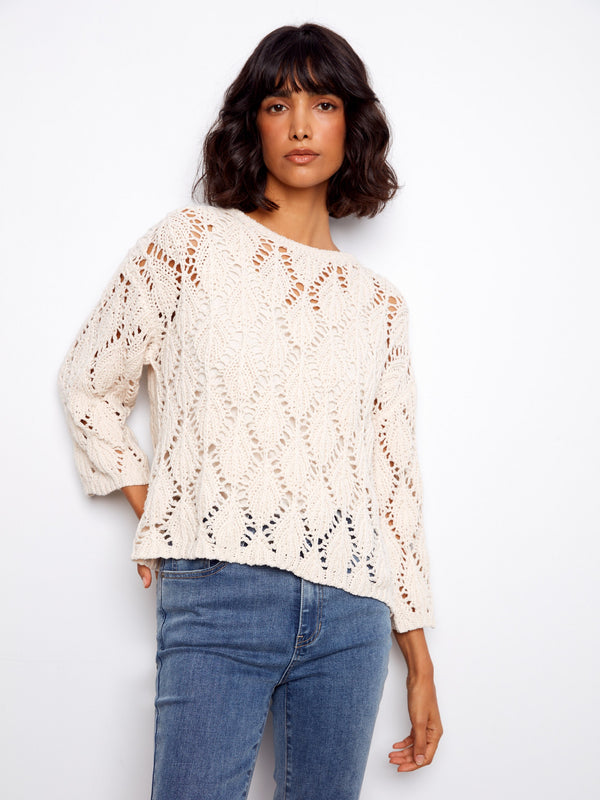 Elegant cotton blend sweater with a relaxed fit, perfect for casual outings. Designed by Charlie B.