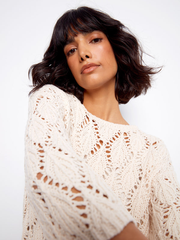 Chic crew neck design in a breathable cotton blend, ideal for layering. Created by Charlie B.