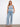 The sleeveless design of this top enhances comfort and style, making it perfect for warm weather outings. By Charlie B.