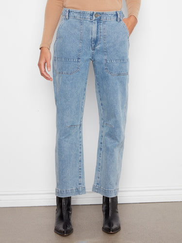 Blue stretch denim jeans featuring a regular rise and practical patch pockets, styled by Charlie B.