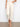 Natural-colored barrel leg jeans with a regular rise, showcasing the trendy cropped length and stretch twill material by Charlie B.