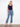 These blue cropped bootcut jeans offer a flattering fit with their trendy side snaps and regular rise by Charlie B.
