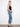 Experience the comfort of stretch denim in these blue cropped bootcut jeans, complete with side snaps at the hem by Charlie B.