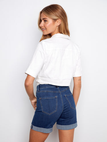 Short length denim shorts with rolled sleeves on the jacket, creating a relaxed summer vibe by Charlie B.
