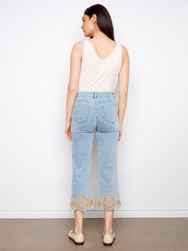 Elegant light blue denim with a flattering cropped length and eye-catching lace hem detail, ideal for everyday wear by Charlie B.