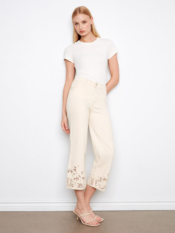 Cropped jeans with a regular rise and floral lace hem, offering a chic flared fit by Charlie B.