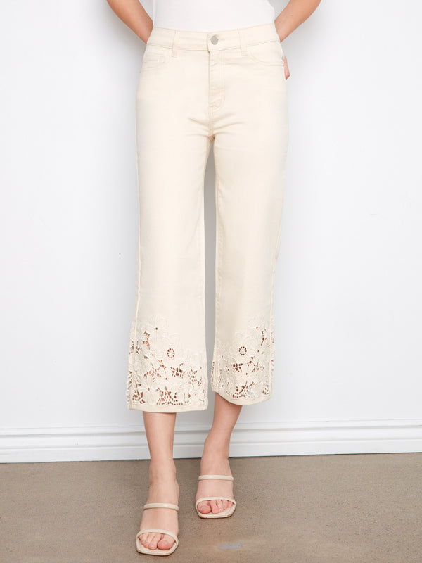 Stylish cropped jeans with a classic five-pocket design and intricate laser-cut lace hem by Charlie B.