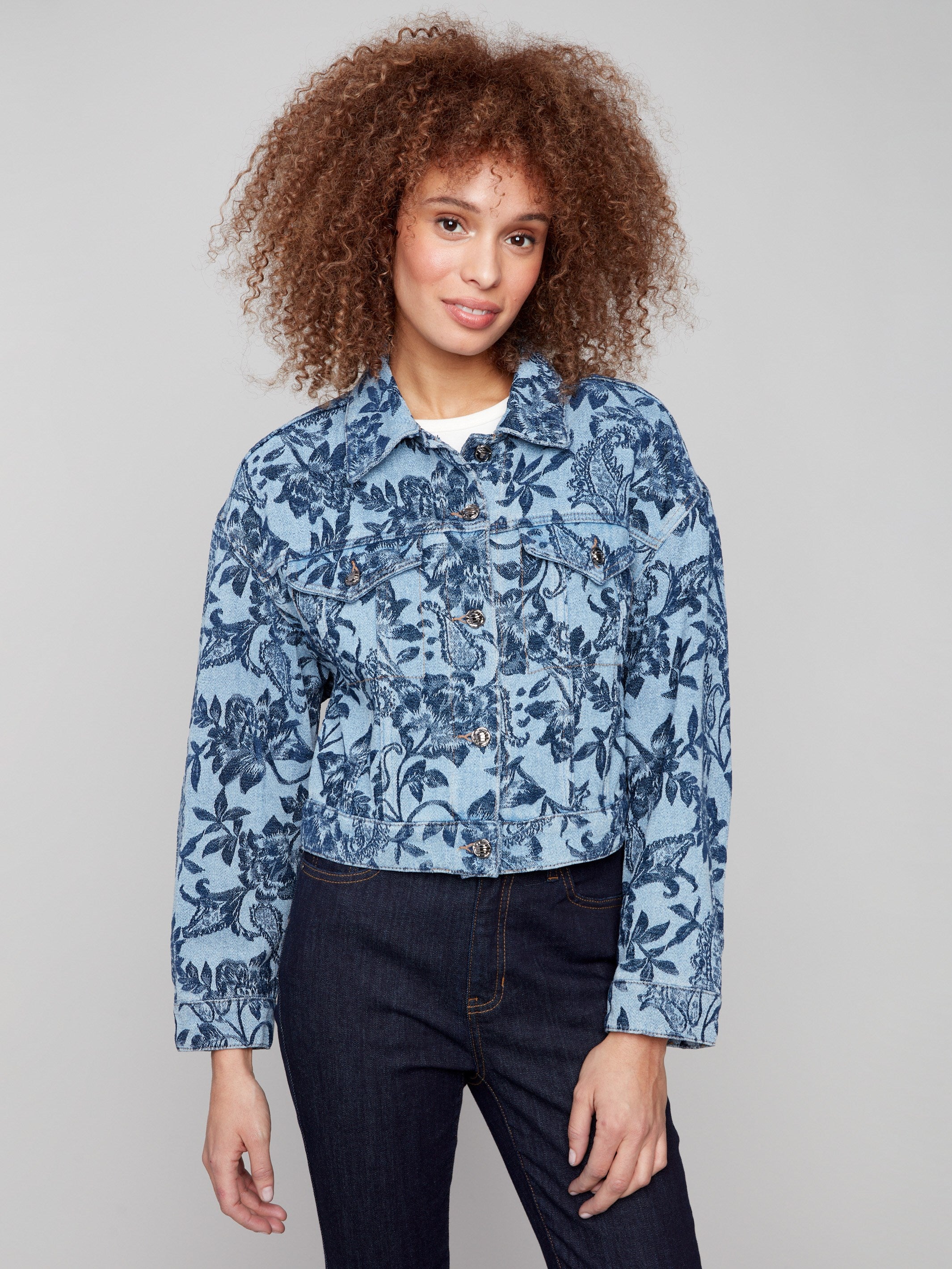 Blue denim jacket featuring a stylish shirt collar and intricate floral jacquard pattern, perfect for casual outings by Charlie B.