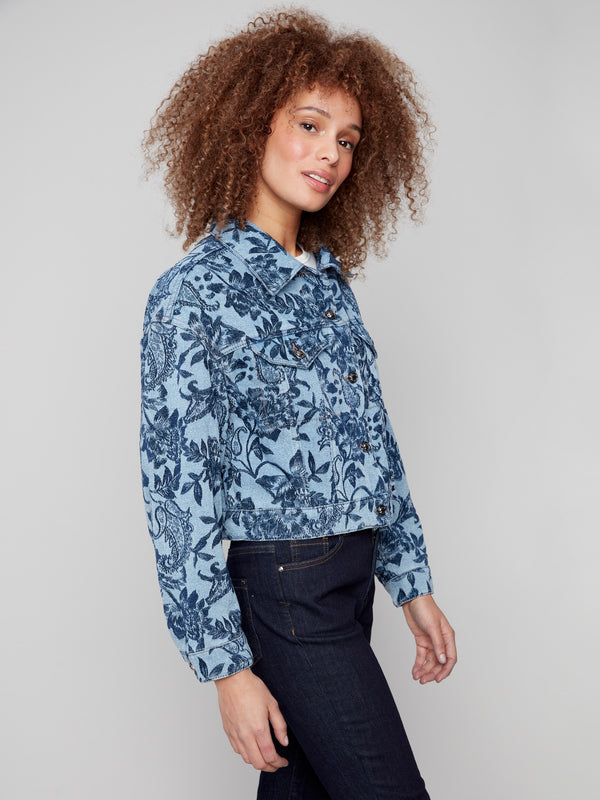 Stylish button-front closure on this blue denim jacket, highlighted by an elegant floral jacquard pattern by Charlie B.