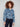 Elegant blue cropped jacket showcasing a stunning floral jacquard design, ideal for layering over any outfit by Charlie B.