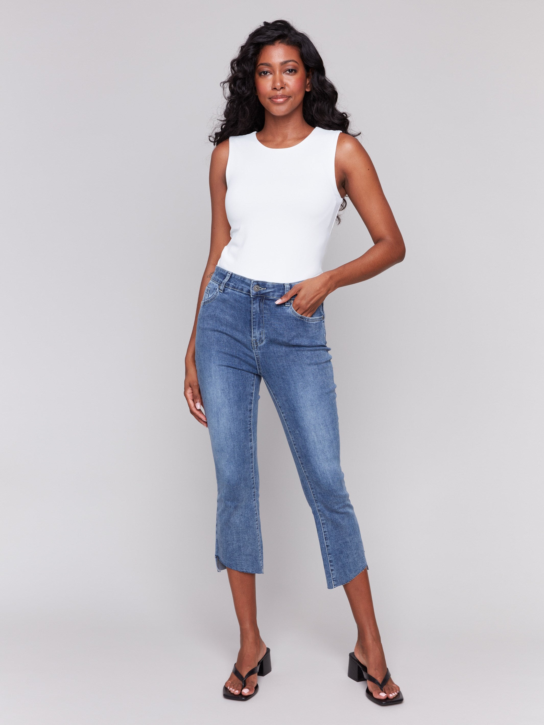 Medium blue jeans with a straight fit, crafted from stretch denim fabric by Charlie B.