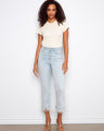 Light blue jeans with a flared leg and frayed details, featuring a regular rise and stretch denim for comfort by Charlie B.