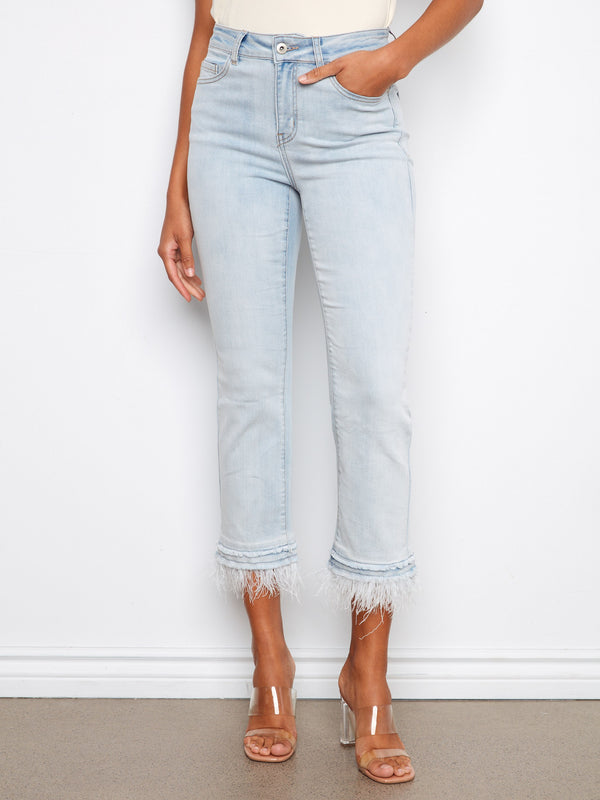 Cropped length jeans with five-pocket design in light blue, complete with removable feather hem accents by Charlie B.