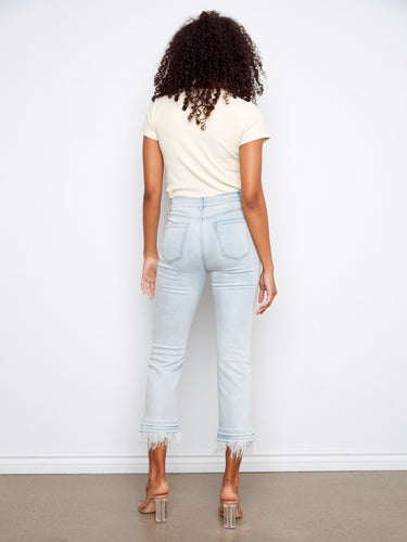 Five-pocket design jeans in light blue with a cropped length and distinctive feather hem detailing by Charlie B.
