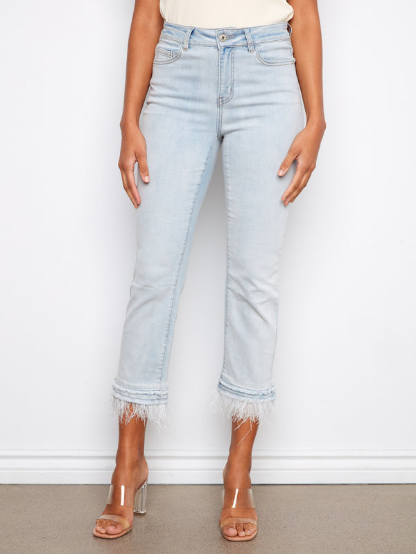 Light blue denim jeans with flared leg style, offering comfort through stretch fabric and regular rise fit by Charlie B.