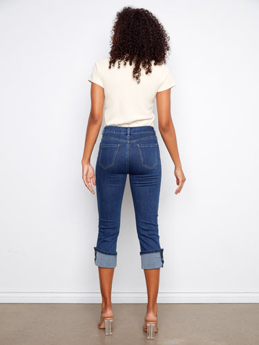 The snap button detail on the cuff adds a trendy touch to these regular rise jeans, enhancing their modern look by Charlie B.