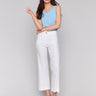 White pants with a cropped length and button closure by Charlie B.