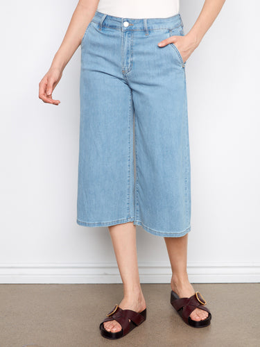 Crafted in a cropped length, these jeans offer a chic and modern twist to your wardrobe essentials. By Charlie B.