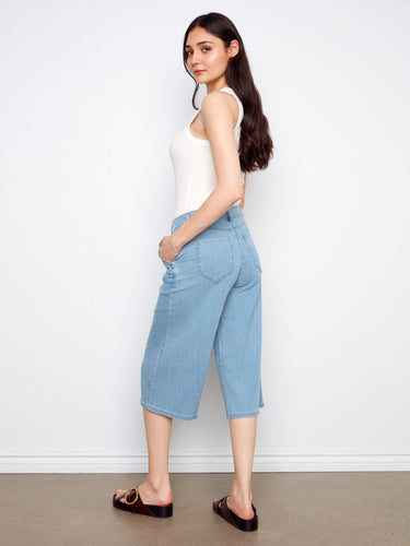 Designed with slash pockets, these jeans combine practicality with style seamlessly. By Charlie B.