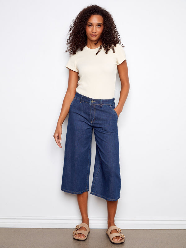 Denim culottes featuring a wide leg fit, offering comfort and style for any occasion. Perfect addition to your wardrobe by Charlie B.