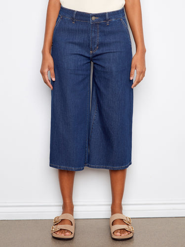These cropped length denim culottes provide a chic and modern look, ideal for casual outings or dressed-up events by Charlie B.