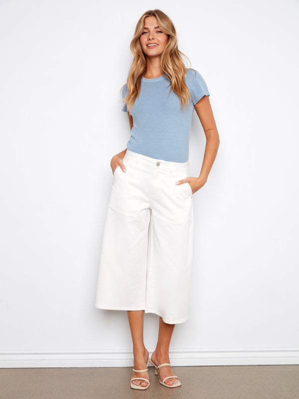 These pants feature a wide leg fit, adding a stylish flair to your outfit. Perfect for any casual occasion. By Charlie B.