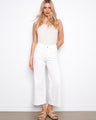 White cropped flare twill pants with a regular rise, featuring stylish patch pockets and stretch fabric by Charlie B.