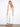 White cropped flare twill pants designed in a trendy flare fit with convenient back pockets by Charlie B.