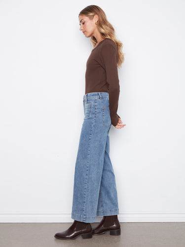 Patch pockets add utility to these stylish jeans, making them practical yet fashionable for any casual outing by Charlie B.