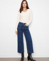 These jeans feature a wide leg design, offering a comfortable and stylish fit for any occasion. By Charlie B.