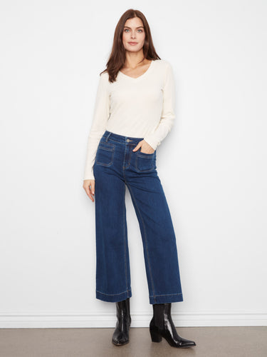 These jeans feature a wide leg design, offering a comfortable and stylish fit for any occasion. By Charlie B.