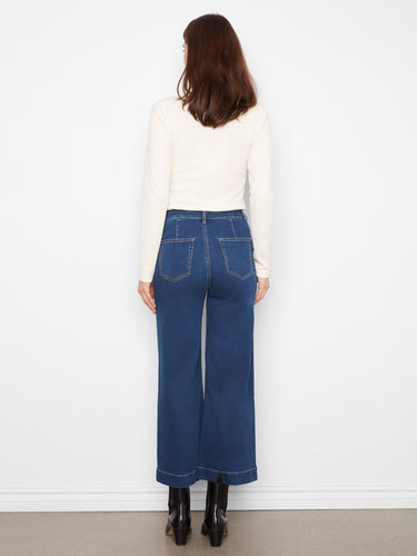 Designed with patch pockets, these jeans combine functionality with modern style effortlessly. By Charlie B.