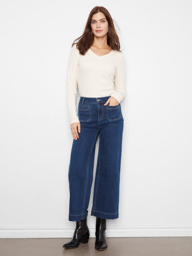 Crafted from stretch denim, these jeans ensure comfort and flexibility throughout the day. By Charlie B.