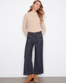 Deep blue wide leg jeans with regular rise and zip fly, styled elegantly by Charlie B.