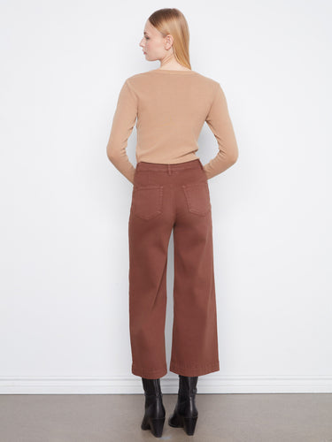 These pants include patch pockets that add both utility and flair to your outfit. Designed with precision by Charlie B.
