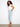 Floral embroidery adds a touch of elegance to these regular rise jeans, made with stretch fabric for ease by Charlie B.