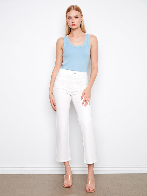 Cropped length white jeans with elegant eyelet detailing on the patch pockets, offering a chic look by Charlie B.