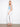Regular rise white jeans in stretch denim, showcasing trendy eyelet patch pockets for added flair by Charlie B.